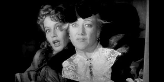 Ellen Drew as Alice Hamilton and Marjorie Gateson as Mrs. Steele, terrified as Geronimo approaches their stagecoach in Geronimo (1939)