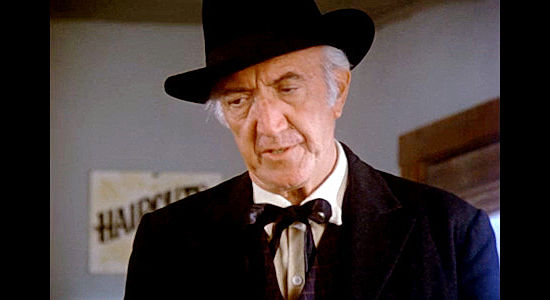 Frank Campanella as Dr. Losey, alerting Sheriff Ward to a dead man in his jail in High Noon II, The Return of Will Kane (1980)