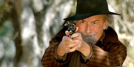 George Voskovec as Herman Pahmeyer, on Karl Westover's trail because of the death of his sons in Barbarosa (1982)