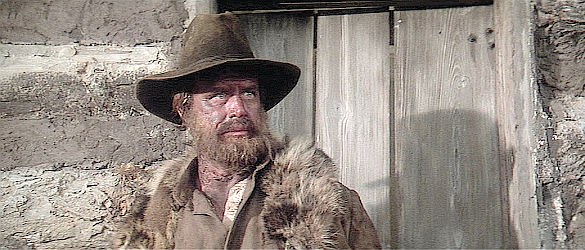 Goeffrey Lewis as Trapper Fred, picking the wrong time to visit Nate Champion in Heaven's Gate (1980)
