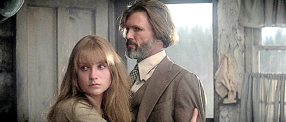 Isabelle Huppert as Ella Watson, trying to separate Jim Averill (Kris Kristofferson) and Nate Champion during a dispute in Heaven's Gate (1980)