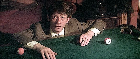 John Hurt as Billy Irvine, Jim's college friend, telling him about the death list in Heaven's Gate (1980)