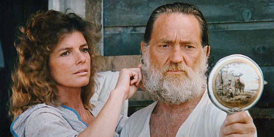 Katherine Ross as Laurie triming the beard of Julian Shay (Willie Nelson) in Red Headed Stranger (1986)