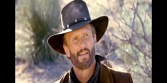 Kris Kristofferson as Ringo, hitching a ride on the stage Marshal Wilcox happens to be traveling in Stagecoach (1986)