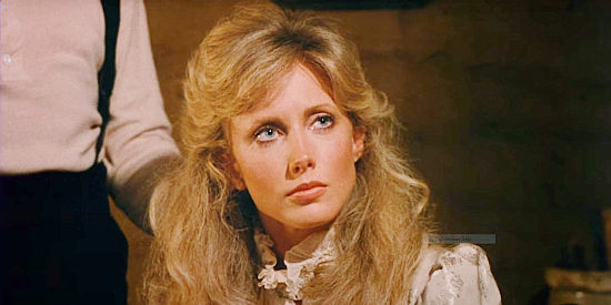 Morgan Fairchild as Raysha Shay, frightened by a wolf head left on her family's door in Red Headed Stranger (1986)