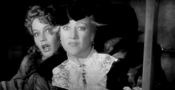 Ellen Drew as Alice Hamilton and Marjorie Gateson as Mrs. Steele, terrified as Geronimo approaches their stagecoach in Geronimo (1939)