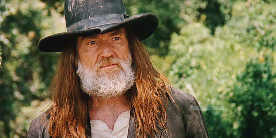 Willie Nelson as Julian Shaw, looking haggard after a spree of revenge in Red Headed Stranger (1986)