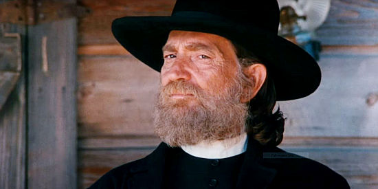 Willie Nelson as Julian Shay, trying to convince residents of Driscoll, Montana to take a stand against the Claver family in Red Headed Stranger (1986)