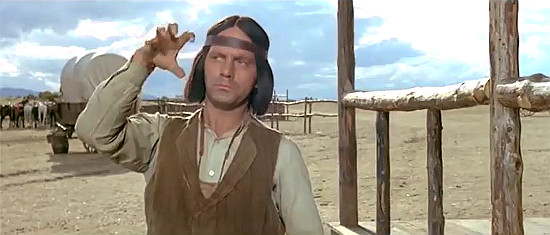 Roy Bosier as Apache, explaining where the MacGregor lads went in Seven Guns for the MacGregors (1967)