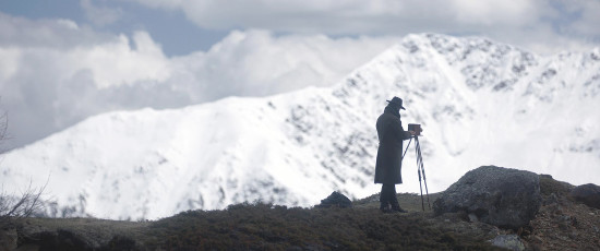 Sam Riley as Greider photographs The Dark Valley (2014)