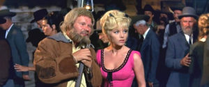 Ralf Wolter as Sam Hawkens with Sophie Hardy as Ann in Desperado Trail ...