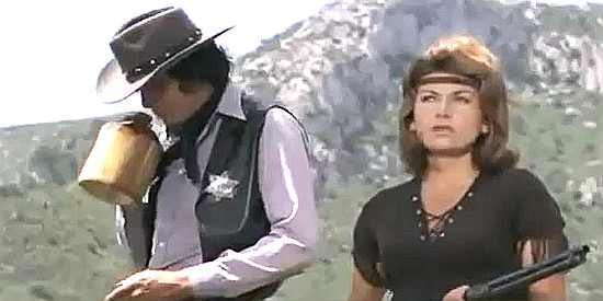 Robert Woods as Sheriff Frank Garringo with Olga Omar as Elaine Farley in Four Candles for Garringo (1971)