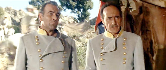 Jose Marco as Gen. Quantrill and Tomas Blanco as his commanding officer work on a battle plan in Assault on Fort Texan (1965)