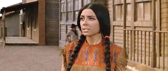 Monica Randall as Anna watches Sugar Patterson ride into danger again in Assault on Fort Texan (1965)