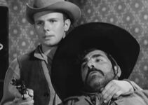 Gary Gray as Johnny, momentarily getting Juan Avila under his gun in Terror at Black Falls (1962)