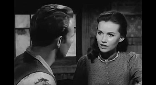 Sandra Knight as Sally Kemper, bursting into a saloon everyone else wants to get out of to check on boyfriend Johnny in Terror at Black Falls (1962)
