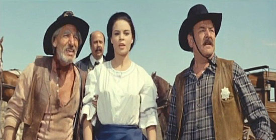 A tense moment for Bernabe Barta Barn as Swan, Mercedes Castro as Eva and Alfonso Rojas as Sheriff Stanton in Dynamite Joe (1967)