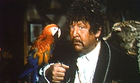 Fernando Sancho as the bandit Pablo Reyes with his parrot Maimiliano in Dynamite Jim (1966)