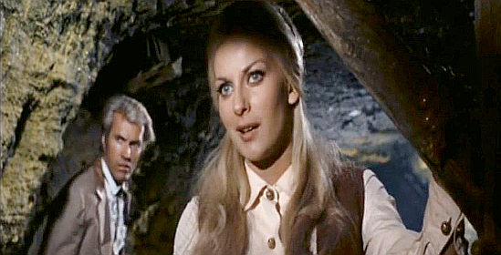 Halina Zalewski as Betty, trying to find a way out of trouble as Joe Ford (Rik Van Nutter) looks on in Dynamite Joe (1967)