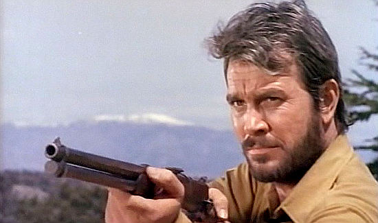 Lang Jeffries as Ross Logan in Requiem for a Gringo (1968)