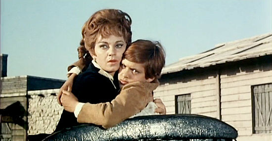 Bruella Brovo (Barbara Hudson) as Nora Danders with her son, Timmy, during a tense moment in Colorado Charlie (1965)