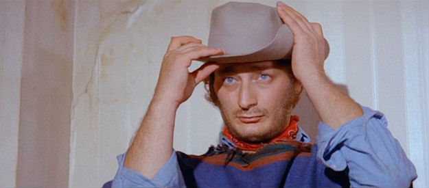 Gary Allen as The Kid, donning his hat after a night spent with a whore in The Wicked Die Slow (1968)