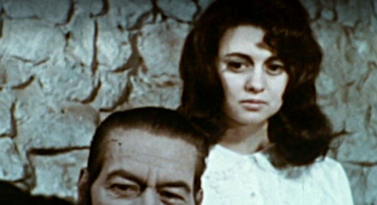 Joan Stapleton as Athaliah, standing faithfully by the side of her much older husband in The Devil's Mistress (1965)