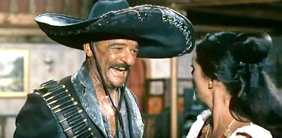 Livio Lorenzon as Ramon Ramirez harassing a saloon girl in God Will Forgive My Pistol (1969)