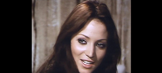 Maria D'Incoronato (Maria Morgan) as female reporter Lorana in Sheriff of Rock Springs (1971)