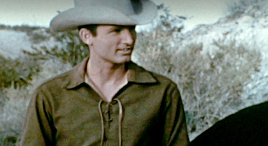Robert Gregory as Frank Oren, the youngest of the four cowboys traveling through the mountains in The Devil's Mistress (1965)