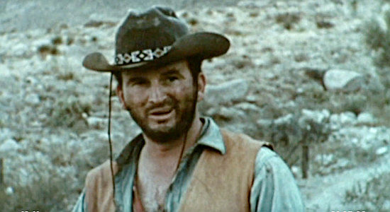 Wes Moreland as Charlie, looking forward to a lusty good time when he learns Athaliah is mute in The Devil's Mistress (1965)
