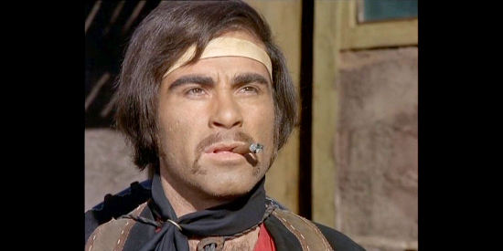 Benito Pacifico (Dennis Colt) as Ramirez in Barrel Full of Dollars (1971)