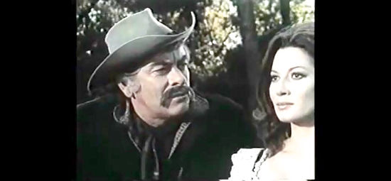 John Ireland as Abe Webster with Rosalba Neri as Katherine in Blood River (1974)