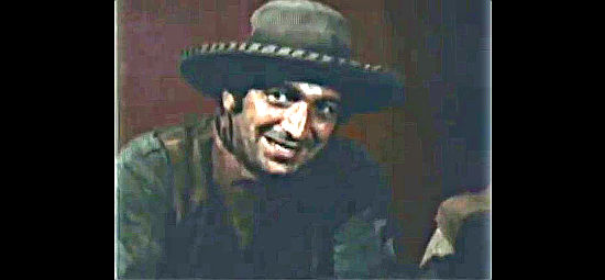 Nicholas Georgiade as Neil Robertson in The Taste of the Savage (1971)