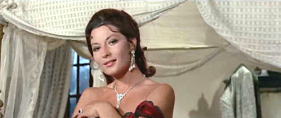 Rosalba Neri as Agnes, dripping diamonds, undressing and distracting El Supremo in The Great Treasure Hunt (1972)