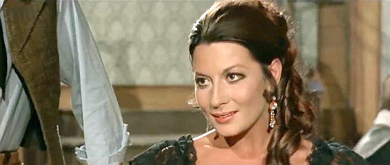 Rosalba Neri as Agnes. offering a card bet a cowboy can't refuse in The Great Treasure Hunt (1972)