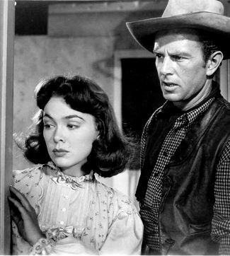 Barbara Rush as Nora Logan with Sterling Hayden as Tex McCloud in ...