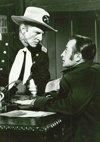 Bruce Bennett as Capt. Jim Hewson with Cec Linder as Dan Carver in Flaming Frontier (1958)
