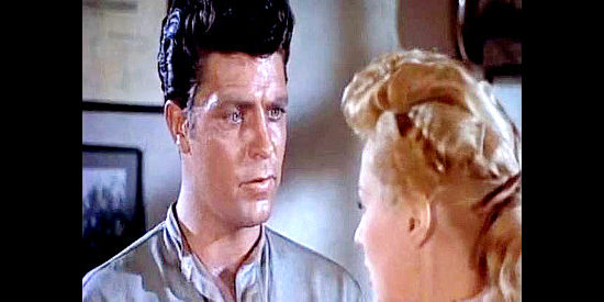 Dale Robertson as Billy Reynolds, trying to warn Abby Nixon about Jess Gorman in Devil's Canyon (1953)