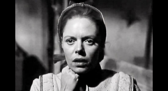 Dee Carroll as 'Crazy' Hanna Gates, reacting to the aftermath of a Comanche assault on a Mexican woman in Five Bold Women (1959)