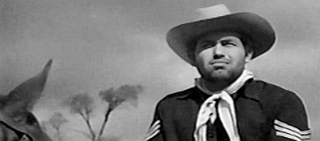 Don Garrard as Sgt. Haggerty, sent West with Capt. Hewson to serve as his personal assistant in Flaming Frontier (1958)