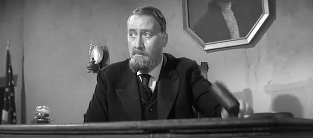 Edward Andrews as Judge Parker, presiding over a trial for Felix Griffin in The Fiend Who Walked the West (1958)