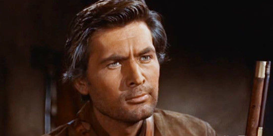 Fess Parker as Davy Crockett, filled in on the situation at the Alamo by Jim Bowie in Davy Crockett, King of the Wild Frontier (1955)