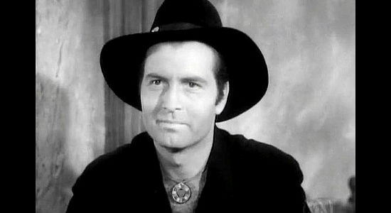 George Montgomery as federal agent Tom Horn, going by Steve Garrett when he meets Dakota Lil and likes what he sees in Dakota Lil (1950)