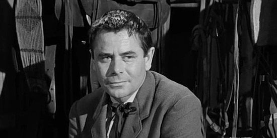 Glenn Ford as George Temple, tired of being viewed as a timid storekeeper in The Fastest Gun Alive (1956)