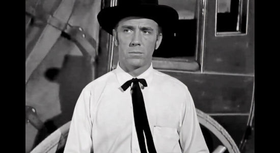 JIm Ross as Jim Downs, aka 'The Missouri Kid,' determined to free wife Ellen Downs from the grasp of Marshal Kirk Reed in Five Bold Women (1959)