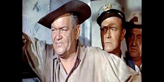 Jay Flippen as Capt. Jack Wells, leader of the prison guards and a man with a grudge against Billy Reynolds in Devil's Canyon (1953)