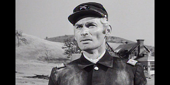 Jeff Chandler as Drango, facing an armed revolt from the people he was sent to help in Drango (1957)