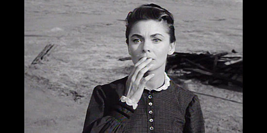 Joanne Dru as Kate Calder, worried about what's about to happen in Kennesaw Pass in Drango (1957)