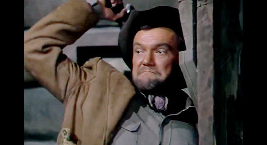 John Kellogg as Jack Welch, about to perform another dirty deed on behalf of Thomas Ainsworth in The Raiders (1952)